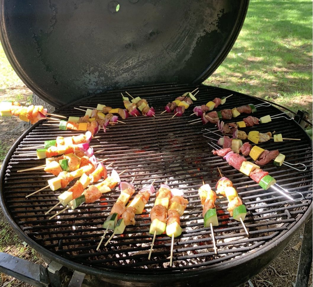 Vegetable and meat skewers on the charcoal grill