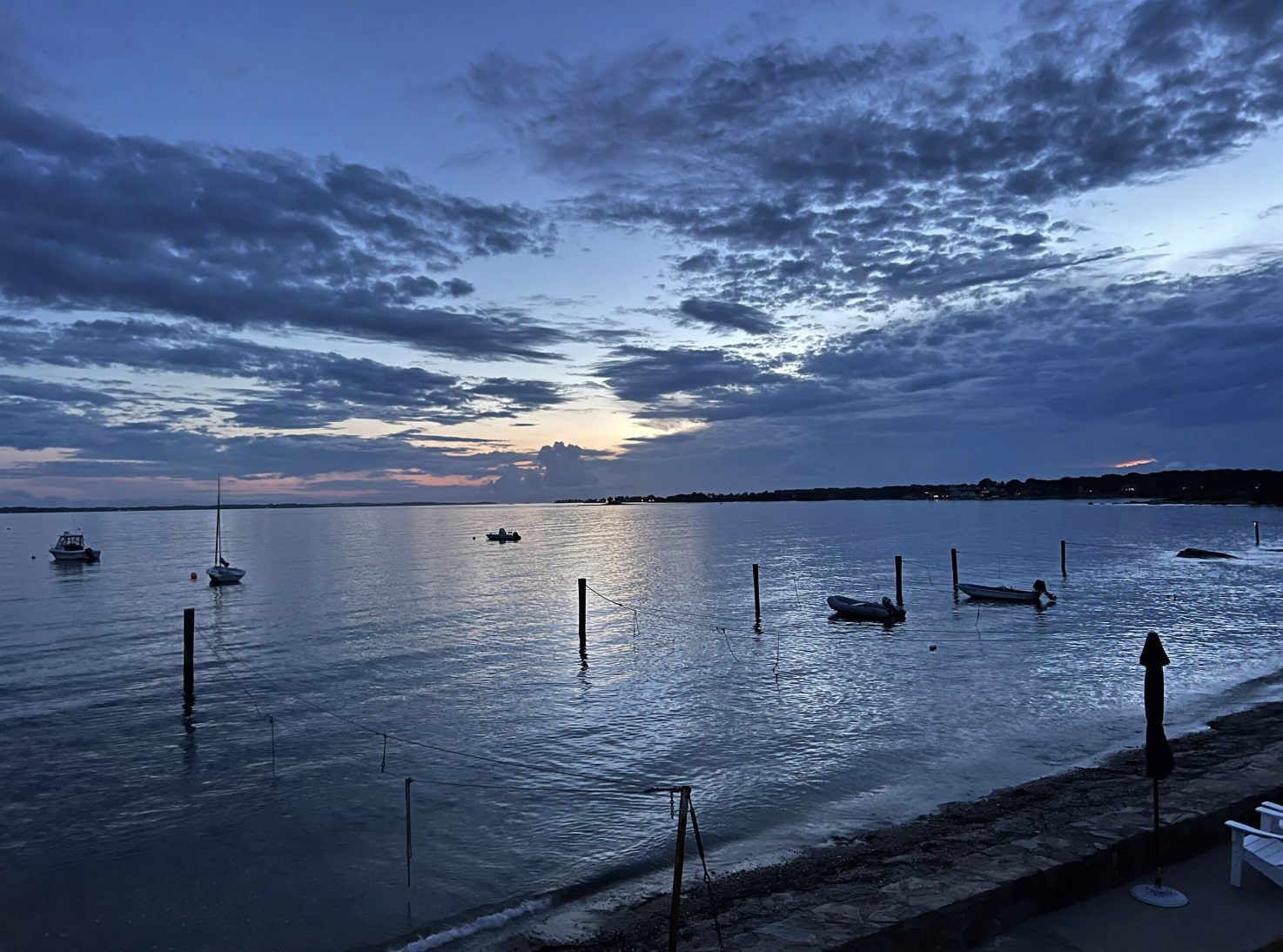 Dusk over the water with moored boats